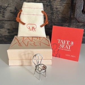 Marla Aaron take a seat for restaurants silver chair